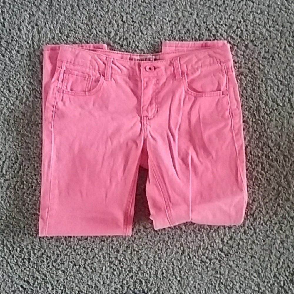 Neon pink skinny jeans